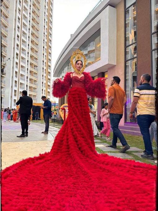Performer in a deep red dress