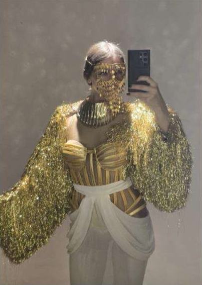 Performer in a gold costume