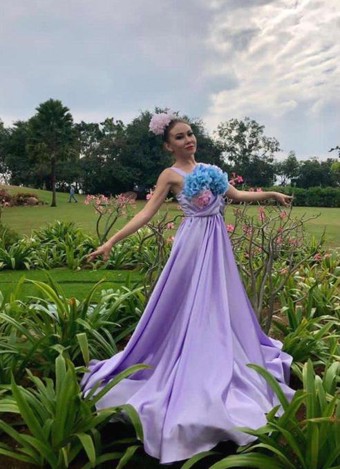 Performer in a floral gown