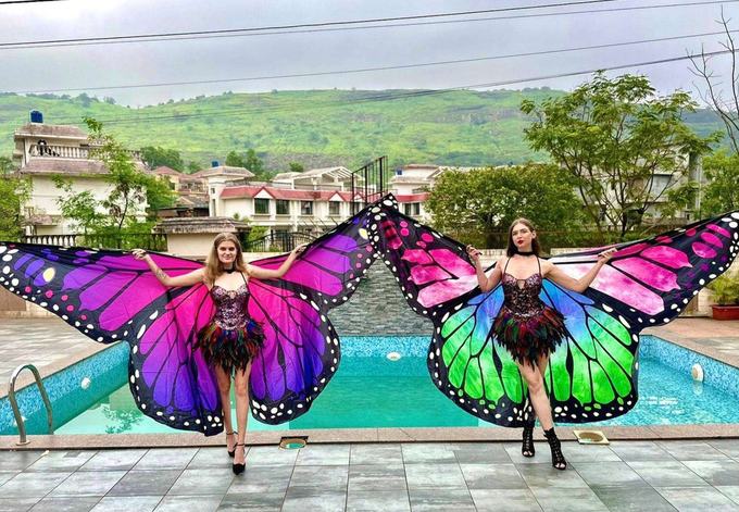 Performers in butterfly costume