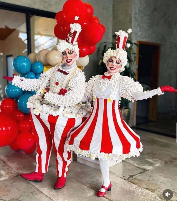 Performers in popcorn costume