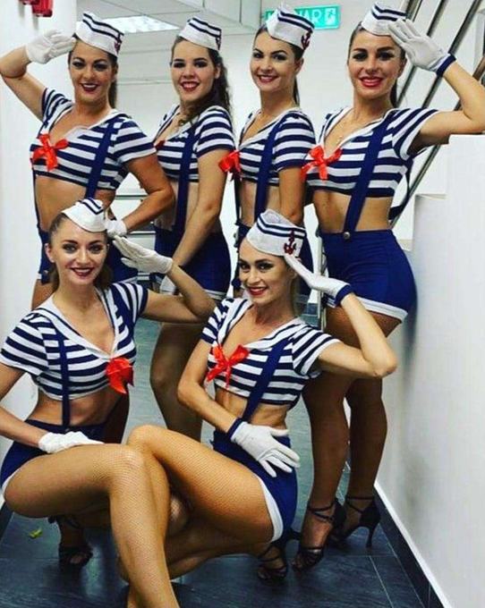 Performers in nautical costume