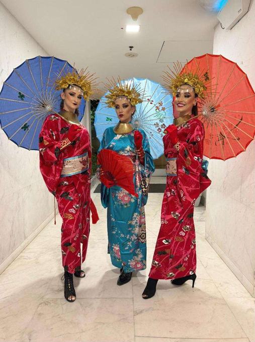 Three performers in kimono