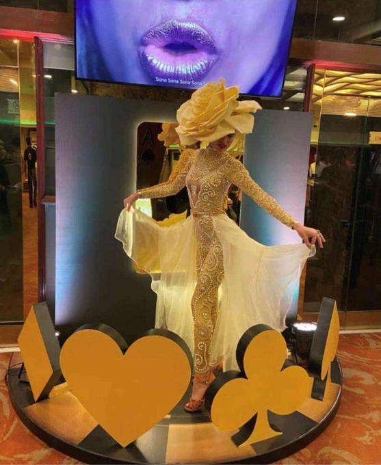 Performer on a gold platform