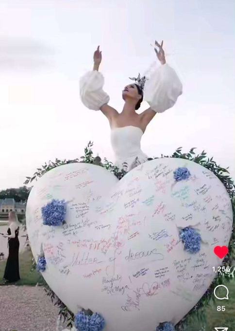 Performer on a heart installation