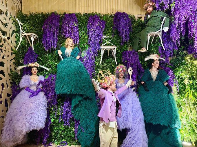 Living artists wall in purple and green
