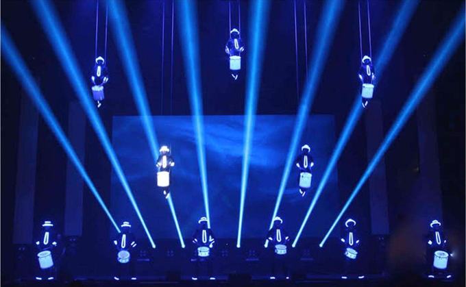 Aerial drummers under blue light