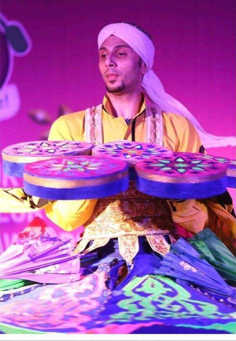 Tanoura performer spinning