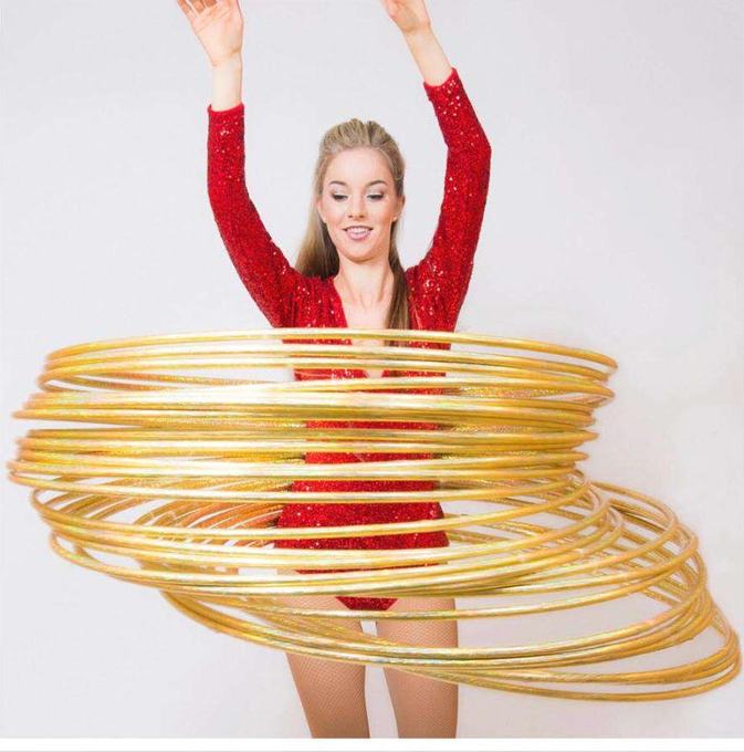 Hula hoop performer in red